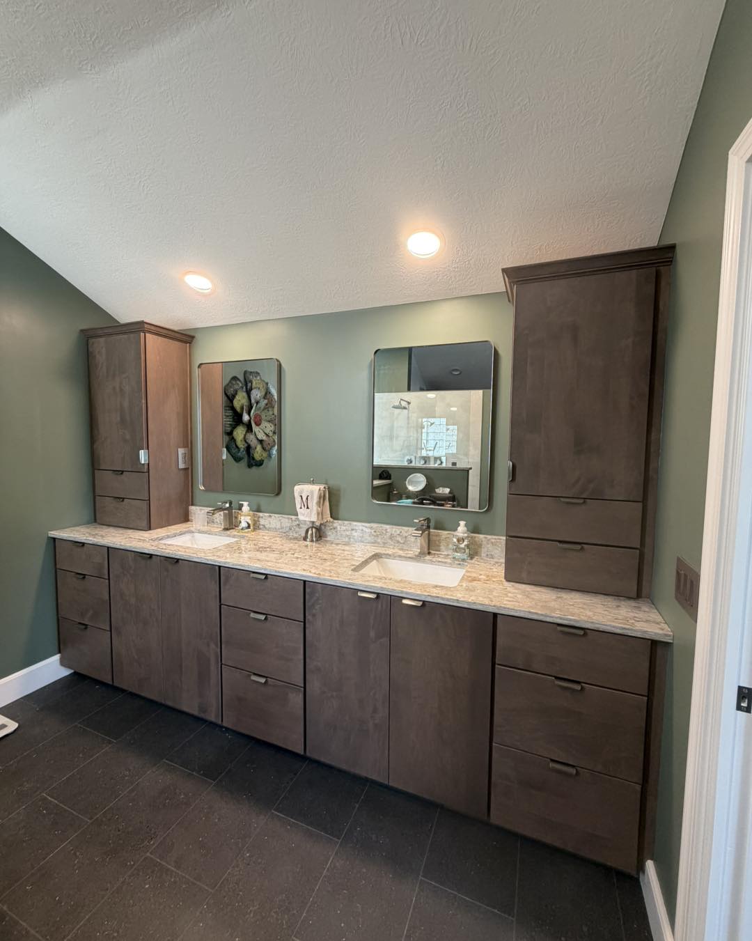 Complete bathroom remodeling with custom cabinets, sink, painting and installation