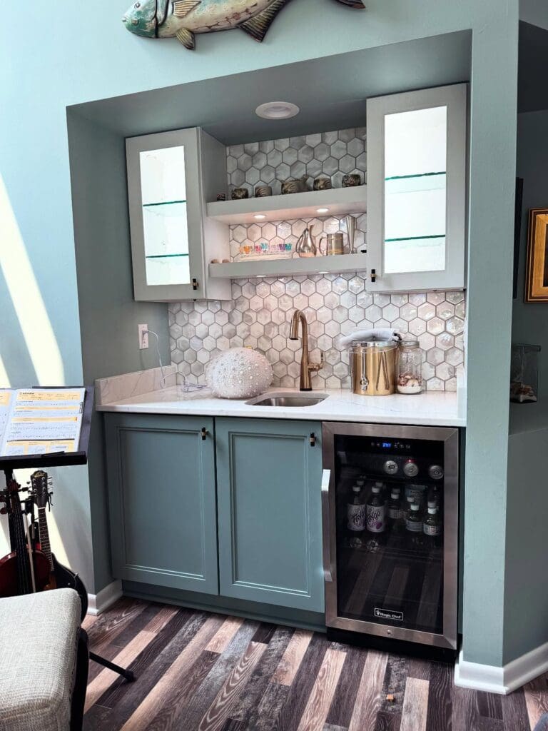 Living room bar area with wine refrigerator and custom cabinets in Hudson, Ohio by Summit County Remodeling